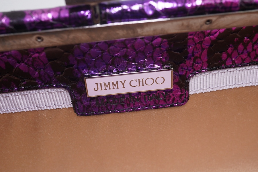 A Jimmy Choo purple and black metallic python? clutch bag